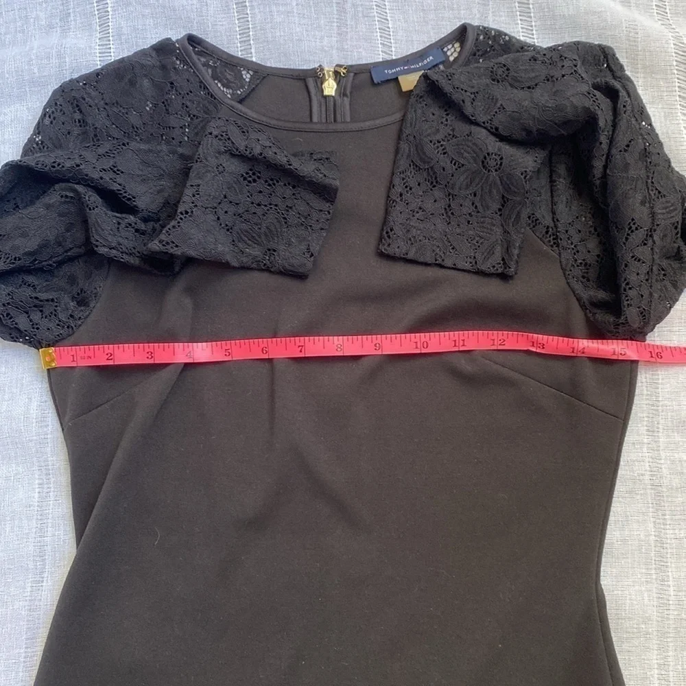 Tommy Hilfiger little black dress with long sleeves lace sleeves.